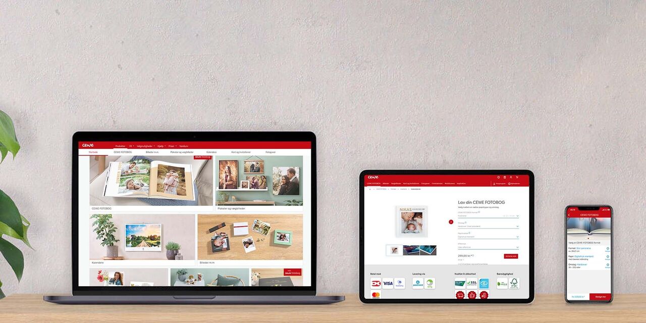 Computer, tablet og smartphone står side om side og viser, hvor du kan lave din fotobog